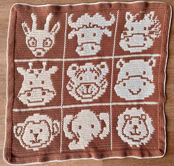 Overlay Mosaic Crochet Pattern - Safari Animals Baby Box Blanket on floor
